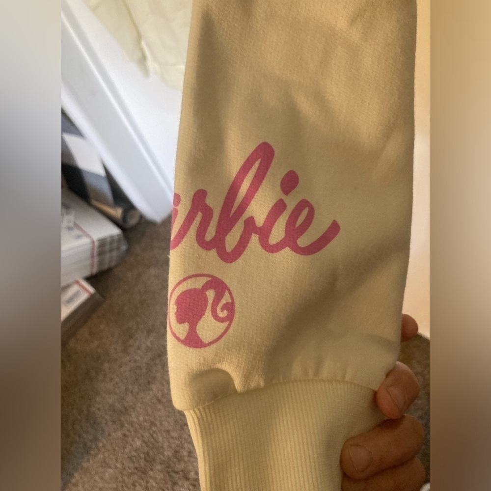 White Barbie sweatshirt in size XL. Has picture of Barbie on a flamingo.1 left - Picture 4 of 4